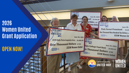 Women United Grant Recipients with large checks